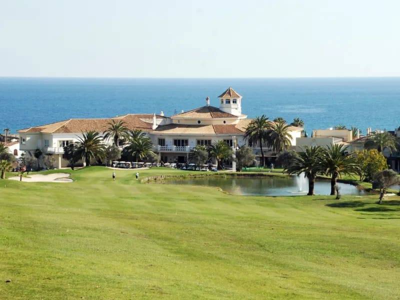 playing golf at La Duquesa Golf